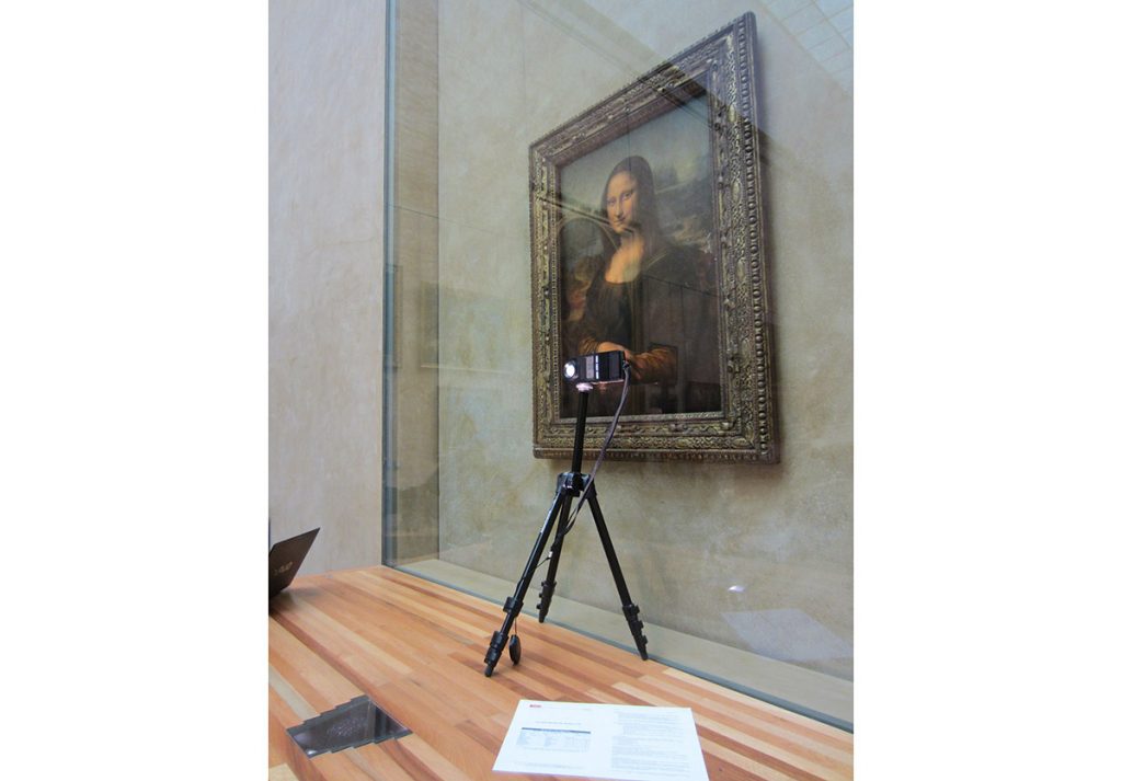 Assessment and adjustments of the accent lighting with the LED spot located in the shelf in front of the Mona Lisa.